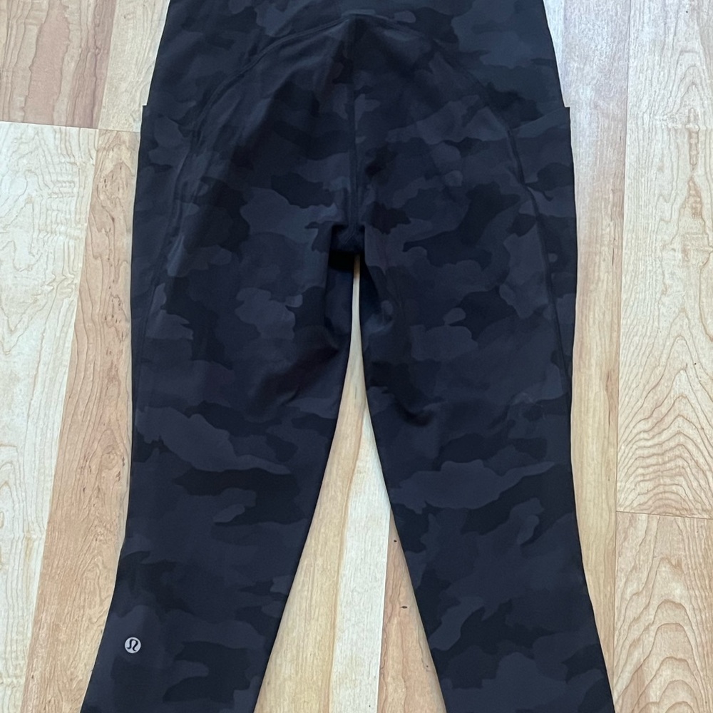 Lululemon size 8 crop Black Camo Leggings with pockets